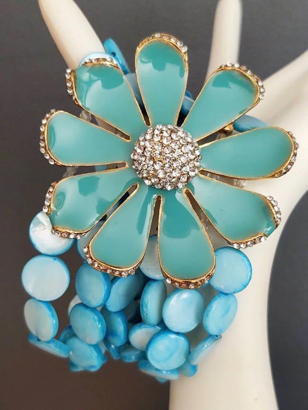 Dyed shell stretch bracelet w/enamel flower& cz's